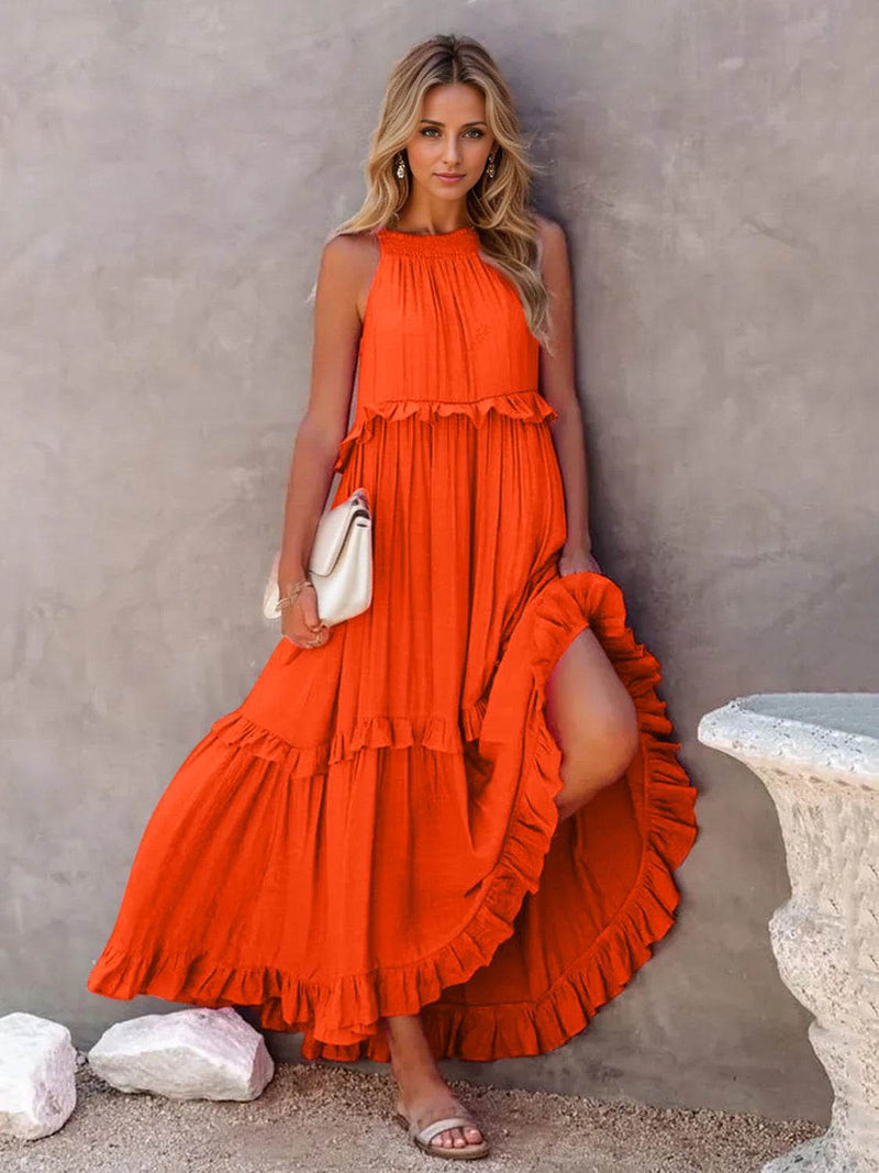 Ruffled Sleeveless Tiered Maxi Dress with Pockets in vibrant orange, featuring high-low design and smocked details.