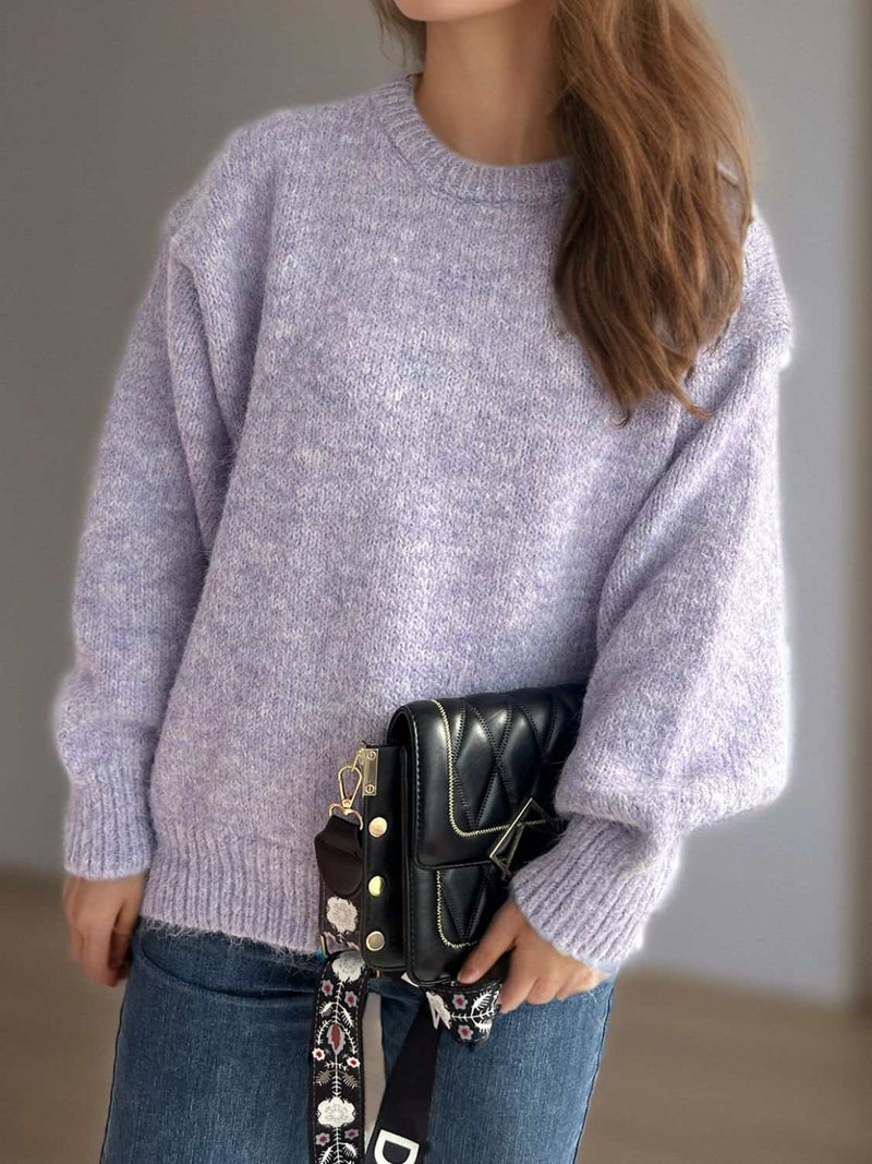 Round neck long sleeve sweater in soft fabric, perfect for chilly days.