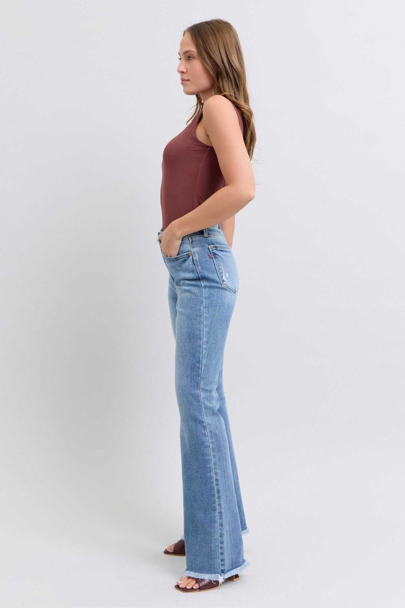 Judy Blue raw hem high rise bootcut jeans styled with tank top.