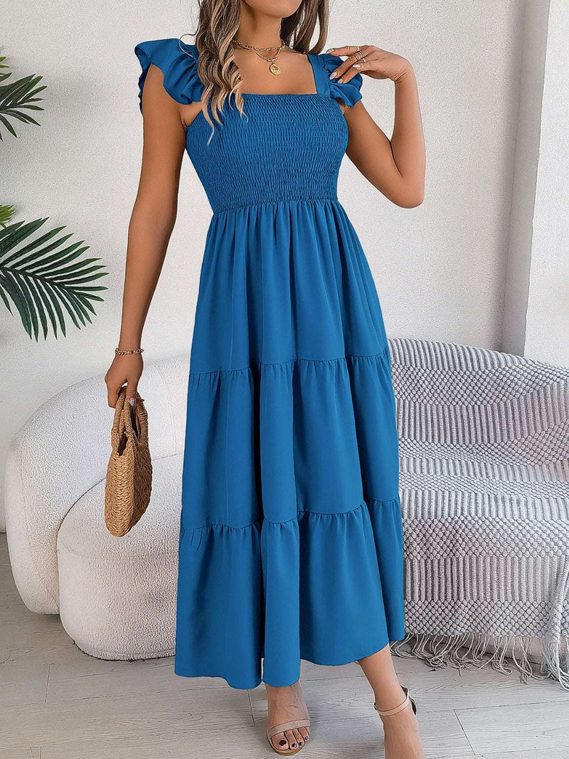 Smocked square neck cap sleeve midi dress in blue.