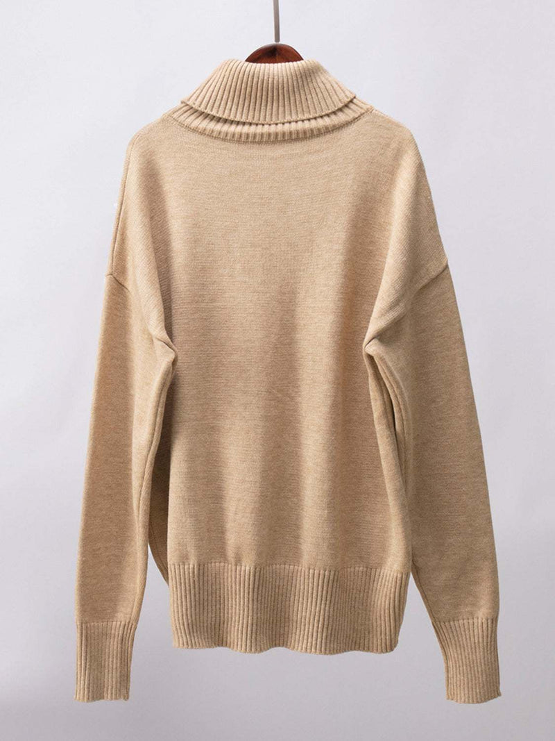 Turtleneck long sleeve sweater in beige, slightly stretchy, viscose-polyester-nylon blend.