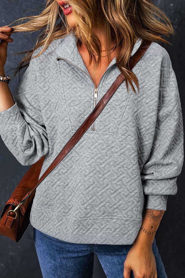 Black solid textured half zipper collared sweatshirt.