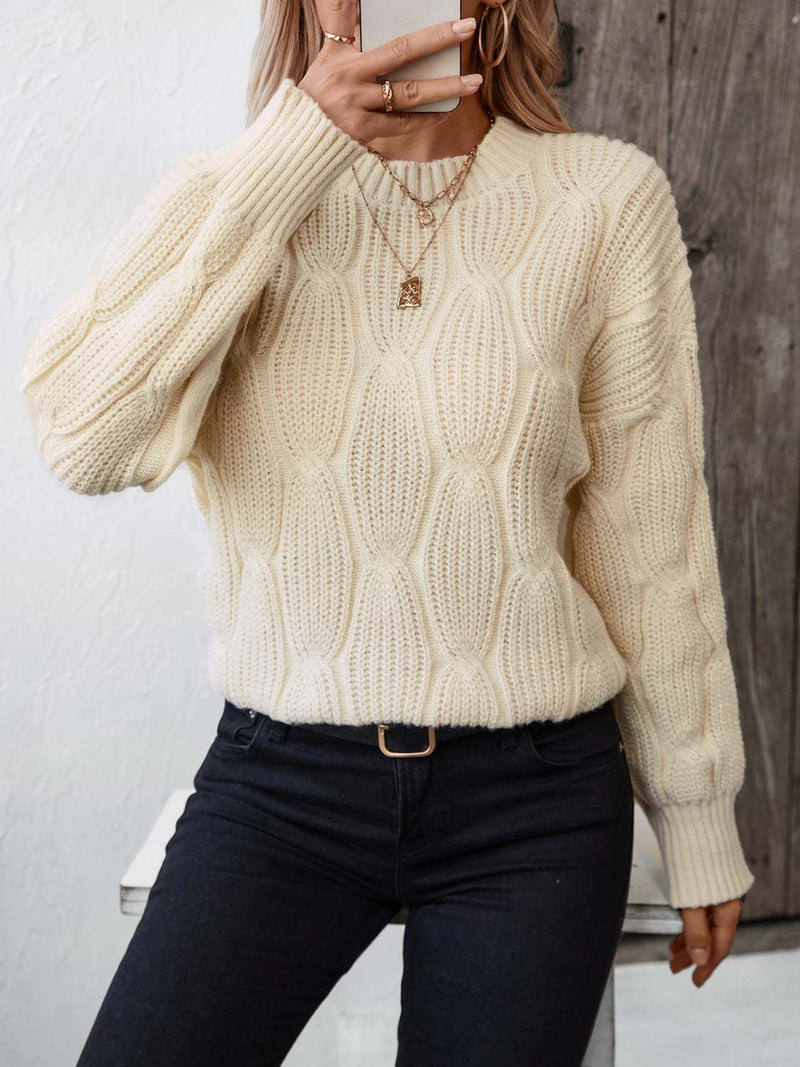 Round neck dropped shoulder sweater in cream, basic style, slightly stretchy polyester.