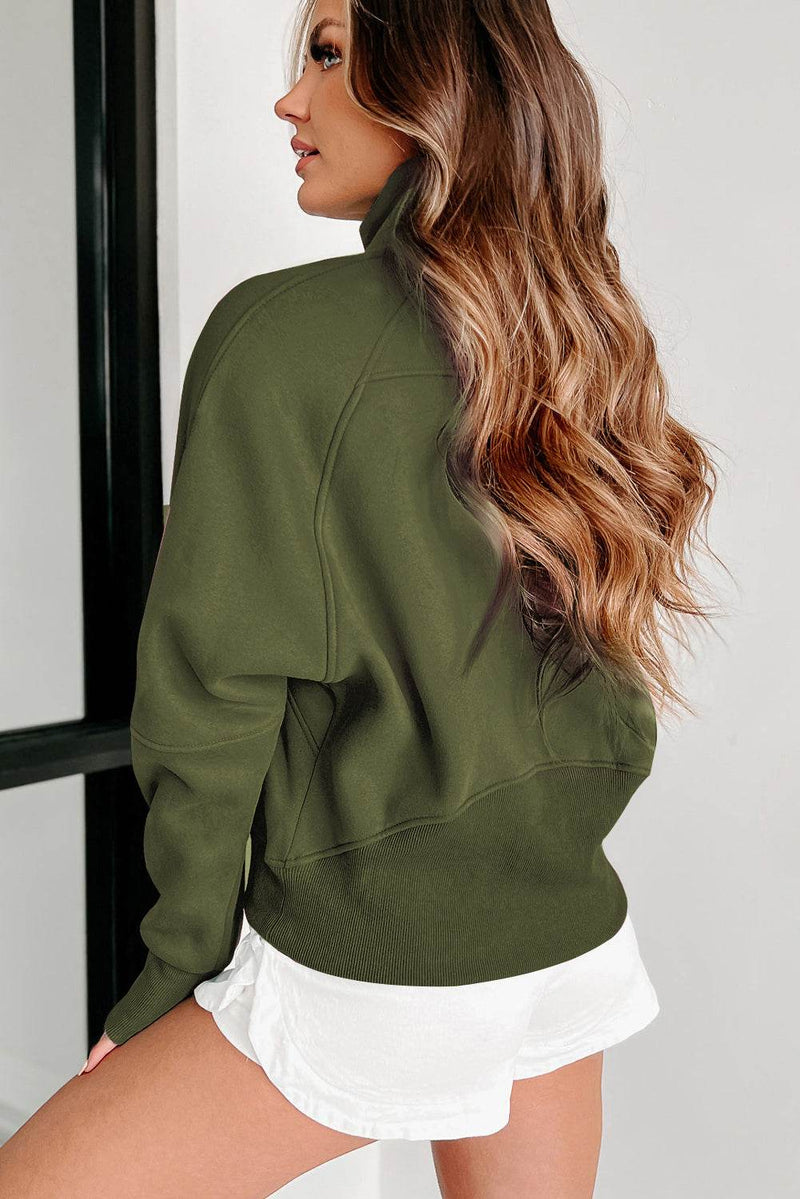 Fleece lined zip up stand collar thumbhole sleeve sweatshirt in olive green.