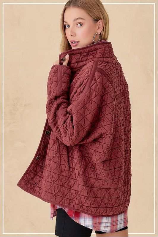 Trendy Rosie Jacket in quilted design shown in maroon, featuring ribbed cuffs and a cozy collar.