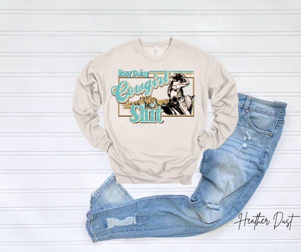 Busy Doing Cowgirl Sweatshirt with a vintage cowgirl design displayed on a white background.
