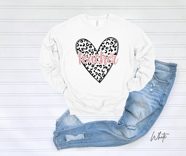 White sweatshirt with leopard heart print and "Teacher" text.