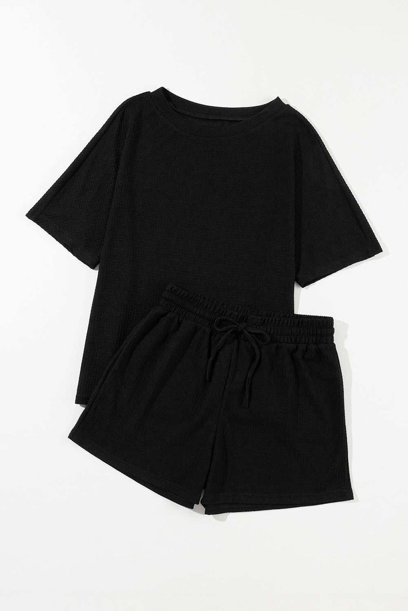 Round Neck Short Sleeve Top and Drawstring Shorts SetFeatures: Drawstring
Number of pieces: Two-piece
Stretch: Slightly stretchy
Material composition: 75% polyester, 25% viscose
Care instructions: Machine wash cold. TuAll TopsTrendsiKlondike Creek Unique BoutiqueRound Neck Short Sleeve Top