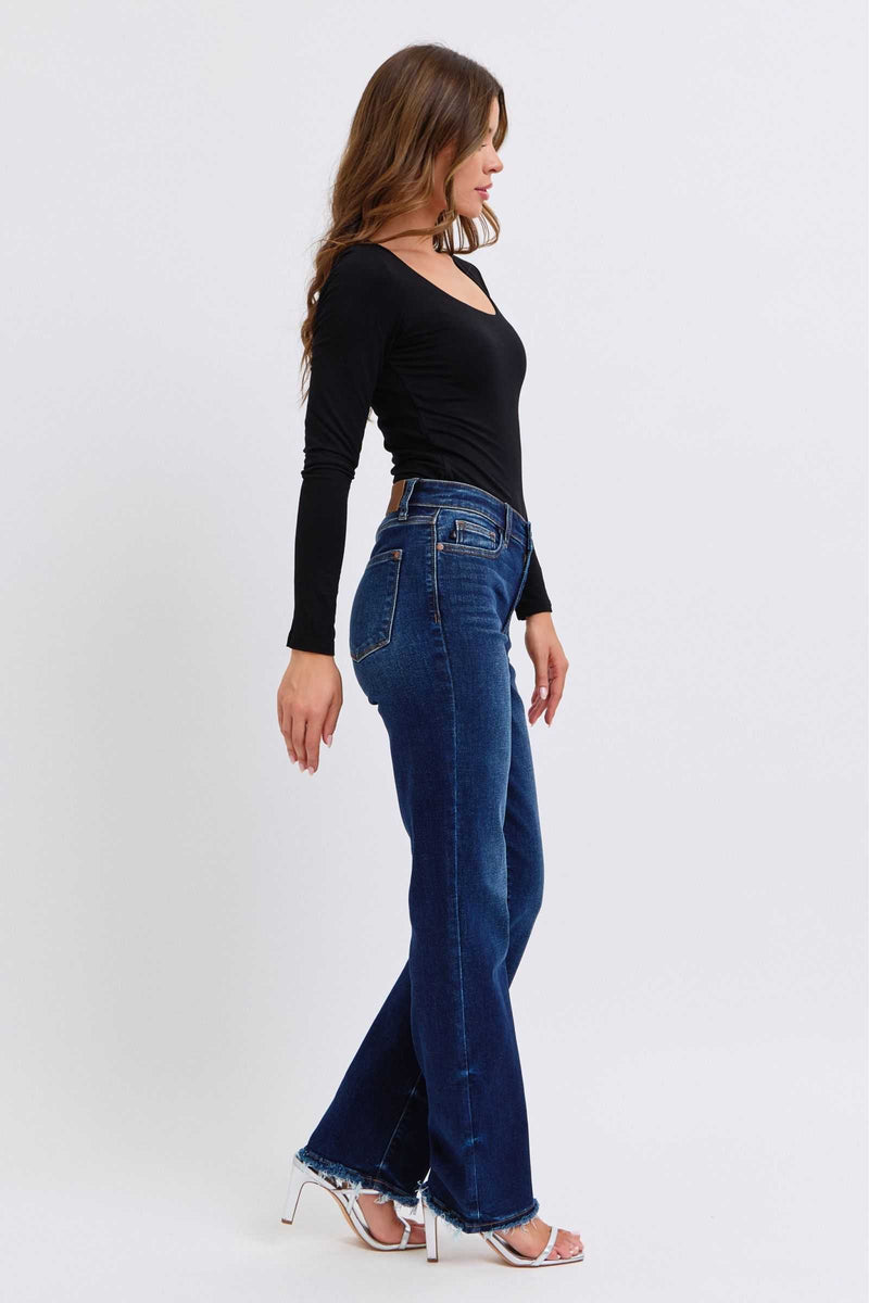 Judy Blue Full Size Raw Hem Straight Leg Jeans on model, side view.
