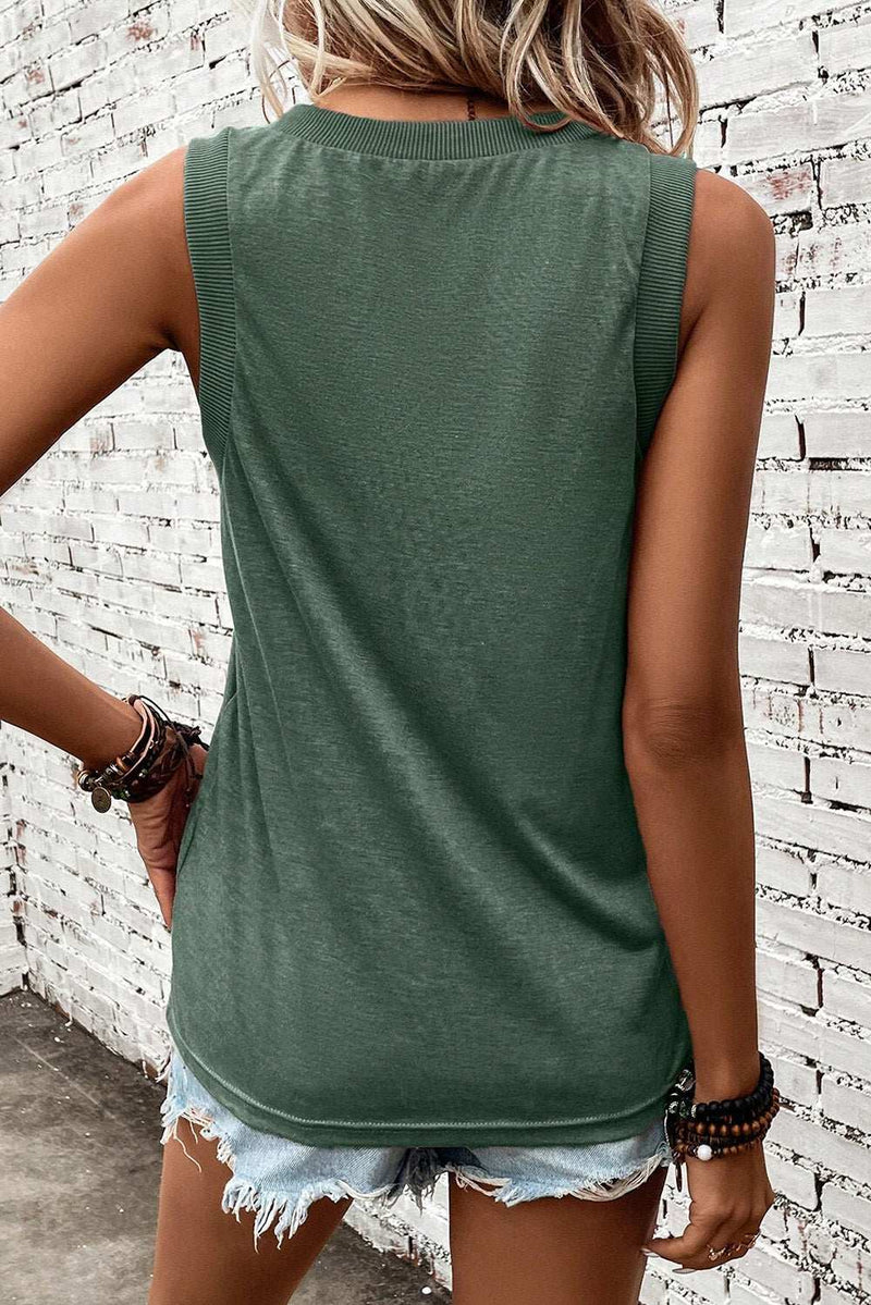 Green V-Neck Wide Strap Tank Top, stretchy polyester blend, shown from the back against a white brick wall.