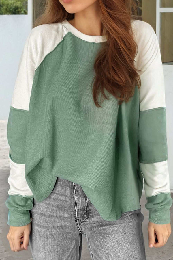 Color Block Round Neck Raglan Sleeve Top with exposed seams.