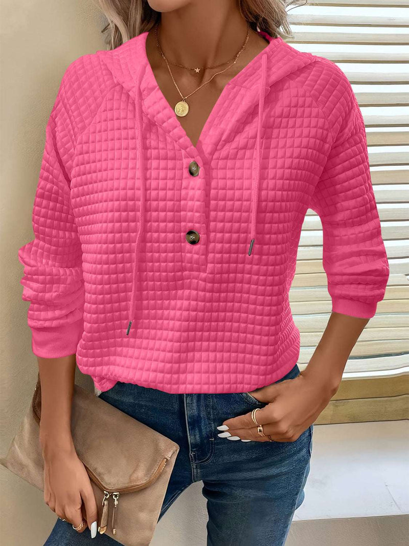Full size textured drawstring long sleeve hoodie with button detail.