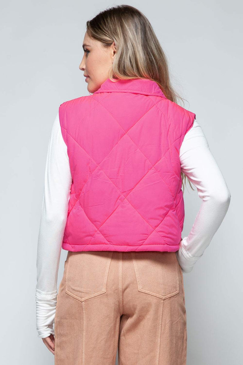 Snobbish Snap Down Quilted Crop VestThe snap-down quilted crop vest is a stylish and versatile addition to your wardrobe. With its snap-button closure and cropped length, this vest offers a modern and OuterwareTrendsiKlondike Creek Unique BoutiqueQuilted Crop Vest