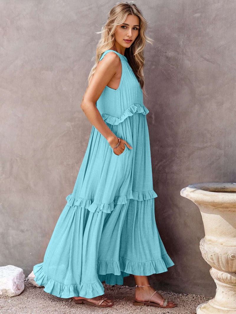 Ruffled sleeveless tiered maxi dress with pockets in blue.