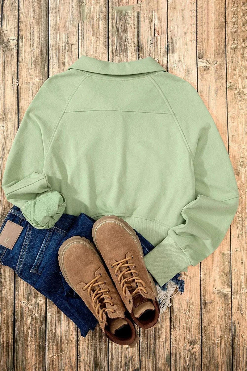 Half Zip Long Sleeve Sweatshirt in mint green with jeans and brown shoes, stylish and cozy for cooler weather.