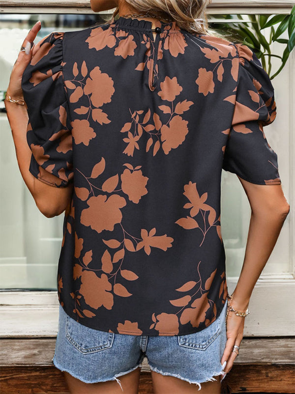 Frill printed round neck puff sleeve blouse with floral design in black and brown.