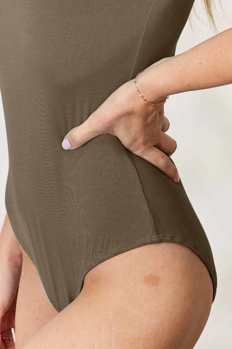 Basic Bae Full Size Round Neck Short Sleeve Bodysuit in olive green, true to size with moderate stretch and opaque fabric.