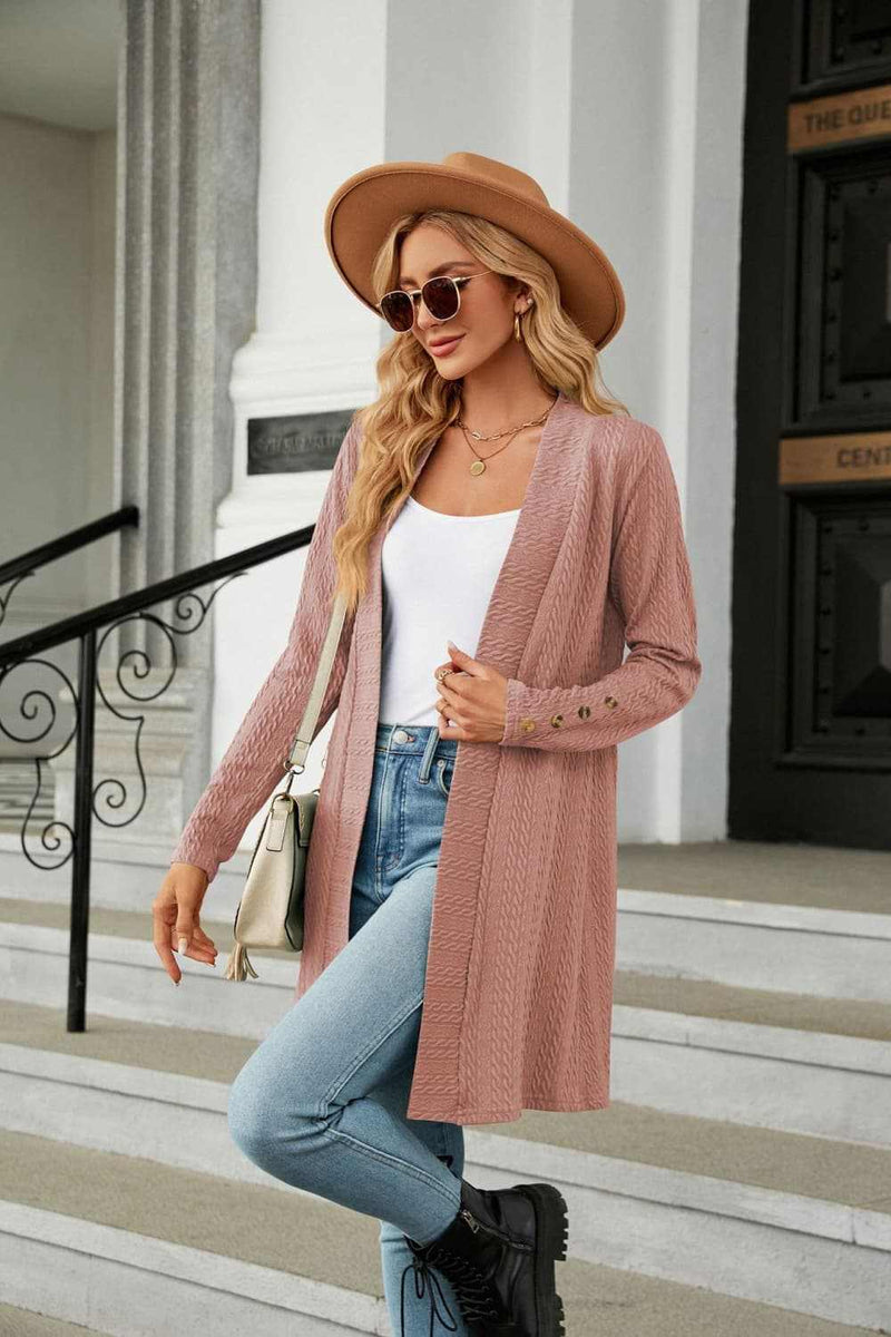Casual solid long sleeve open front cardigan styled with jeans and accessories.