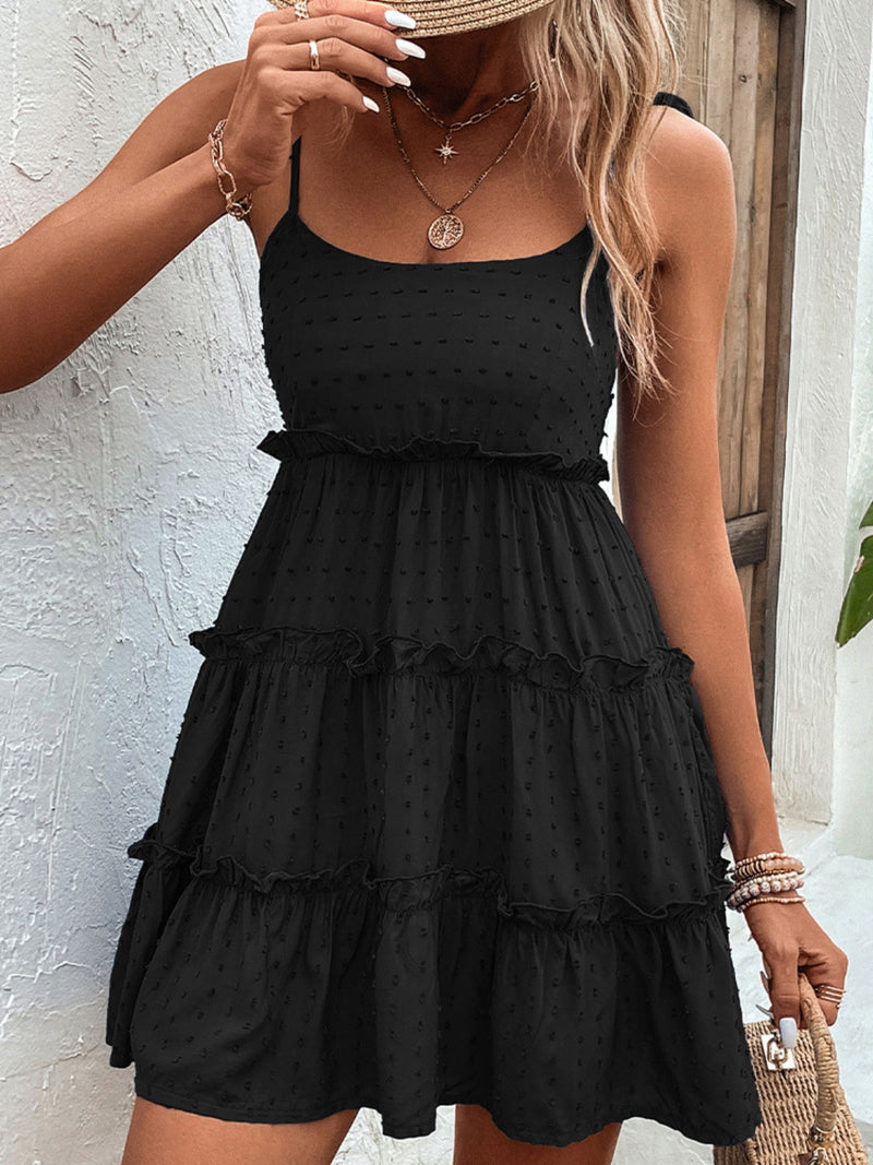 Shiny Frill Spaghetti Strap Tiered Dress in black polyester with tiered design, no stretch, opaque fabric.