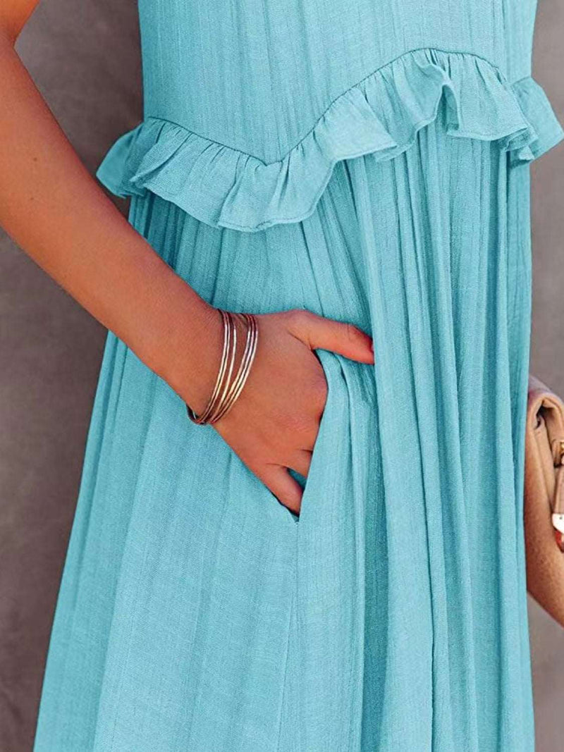 Ruffled sleeveless tiered maxi dress with pockets in blue fabric.