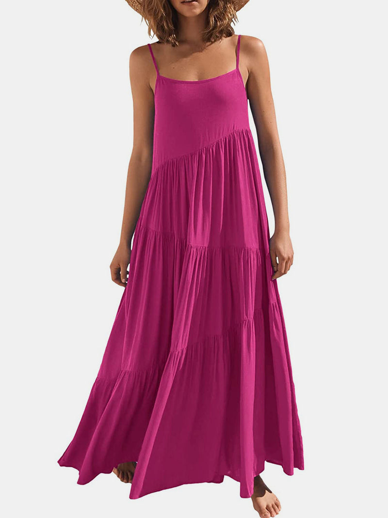 Full Size Ruched Tiered Spaghetti Strap Dress in vibrant pink with moderate stretch.