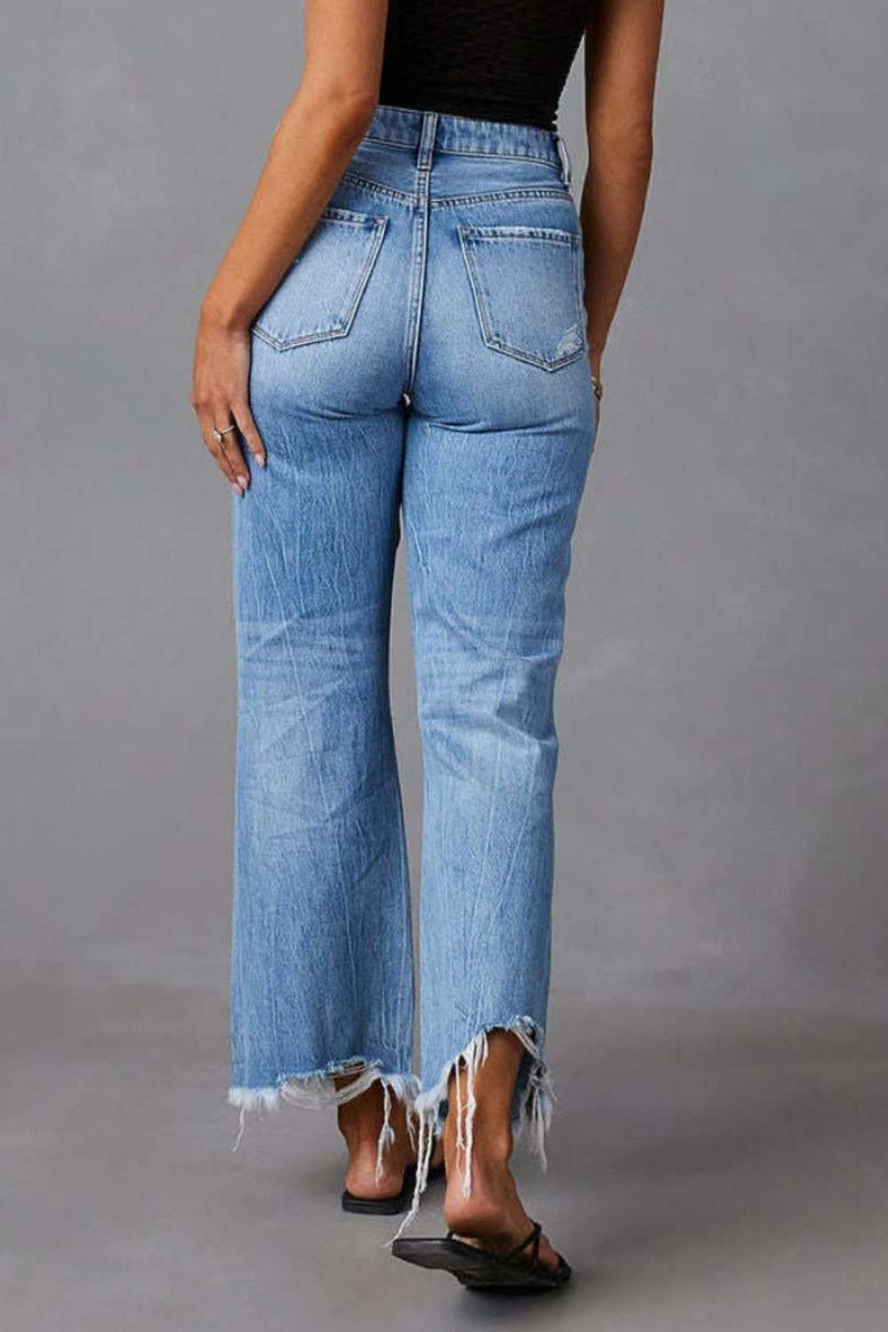 Distressed Raw Hem Jeans with PocketsUpgrade your denim game with our latest addition - the Distressed Raw Hem Jeans with Pockets!
 
 Made from high-quality denim, these jeans are durable and comfortablBottomsTrendsiKlondike Creek Unique BoutiqueDistressed Raw Hem Jeans
