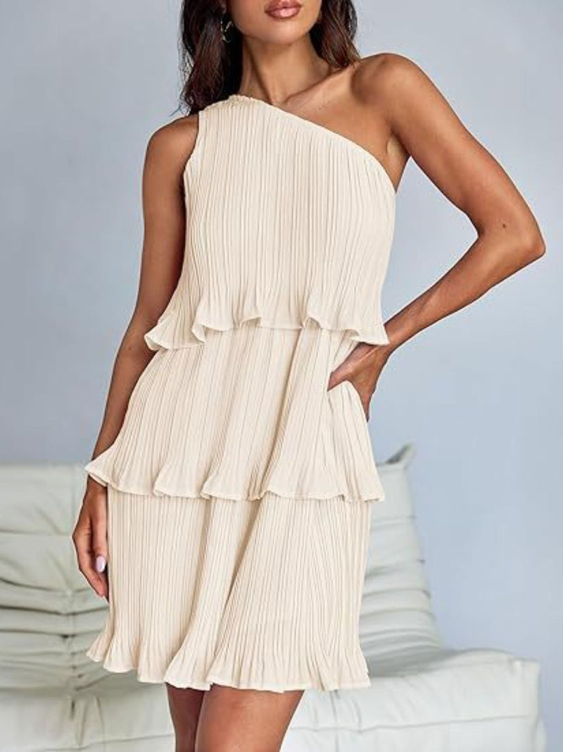 Layered single shoulder mini dress with ruffled design in beige.