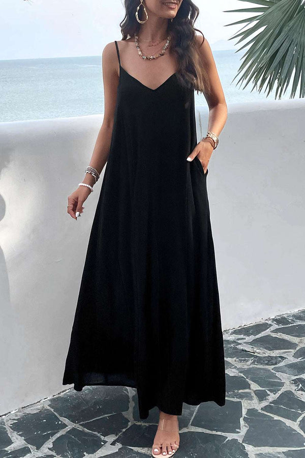 Devine Backless Maxi Cami Dress with Pockets in black viscose fabric.