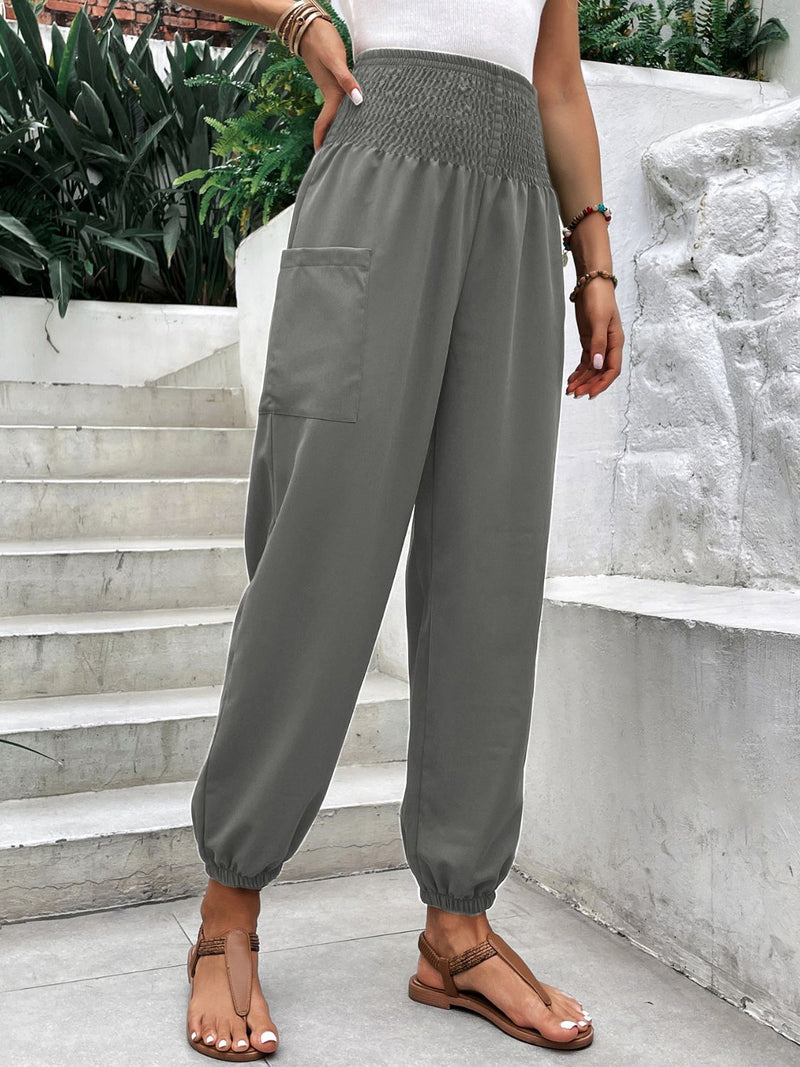 Smocked high rise joggers with pockets in gray, basic style, polyester and spandex blend.