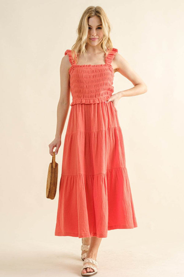 Smocked Ruffled Tiered Dress in coral with ruched bodice and playful ruffles, perfect for a casual summer day out.