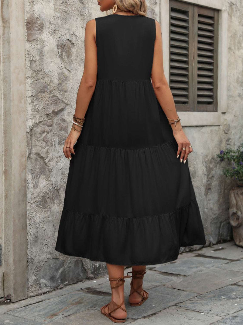 Ivy Lane Decorative Button Notched Sleeveless Dress in black cotton, back view.
