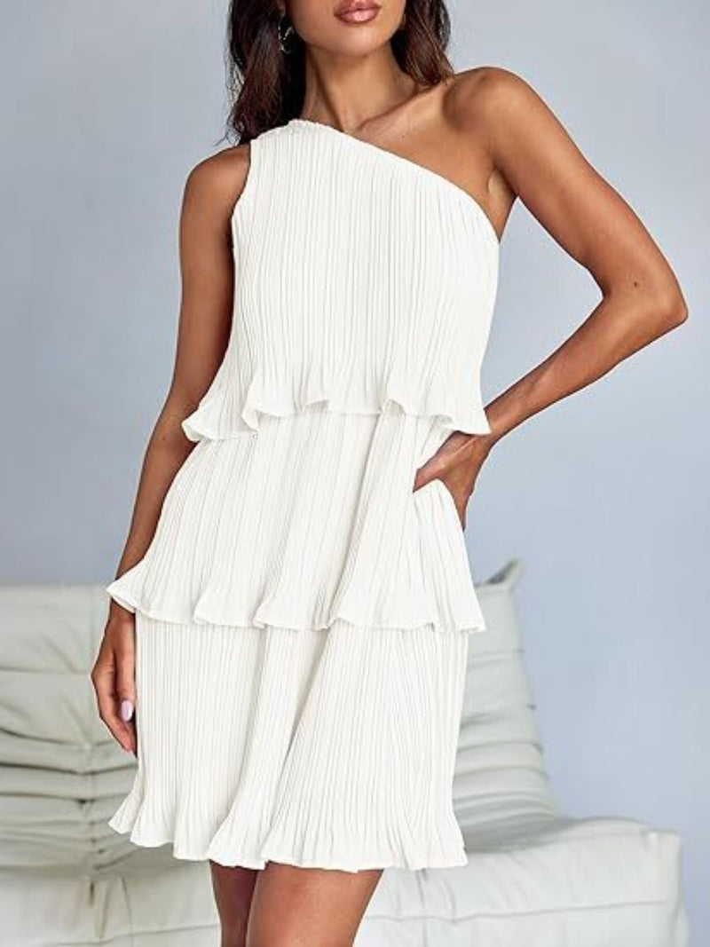 Layered single shoulder mini dress with ruffled layers in white.
