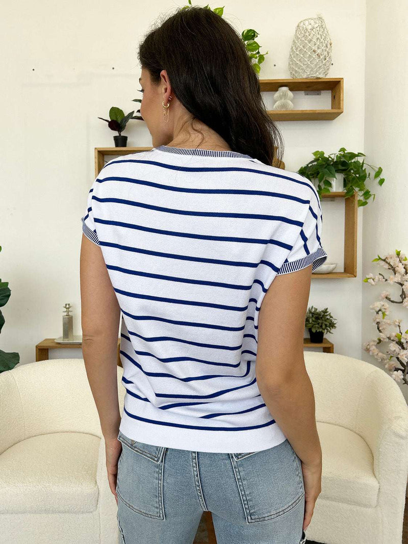 Striped round neck cap sleeve knit top in white with blue stripes, back view.