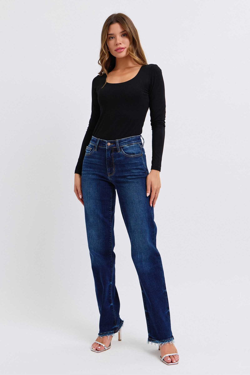 Judy Blue Full Size Raw Hem Straight Leg Jeans on model with black top and heels.