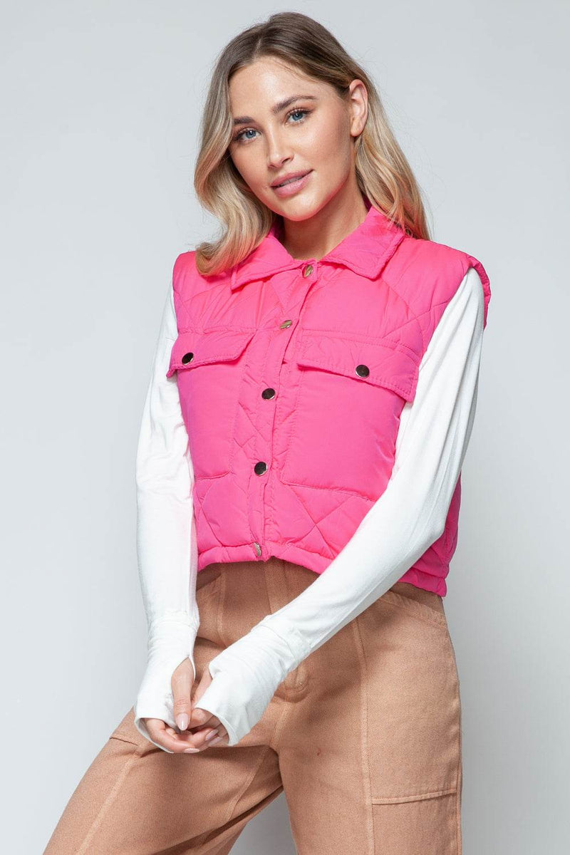 Snobbish Snap Down Quilted Crop VestThe snap-down quilted crop vest is a stylish and versatile addition to your wardrobe. With its snap-button closure and cropped length, this vest offers a modern and OuterwareTrendsiKlondike Creek Unique BoutiqueQuilted Crop Vest