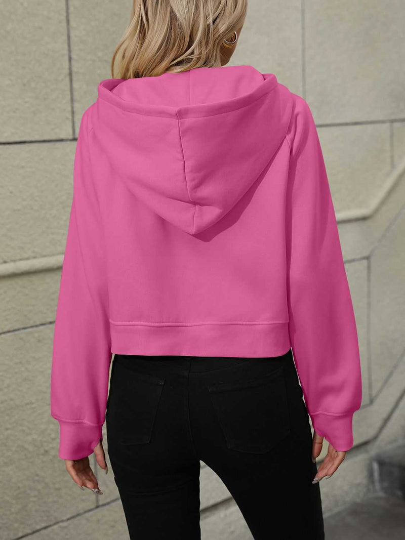 Pink Mandy Half Zip Long Sleeve Sweatshirt with hood, back view.