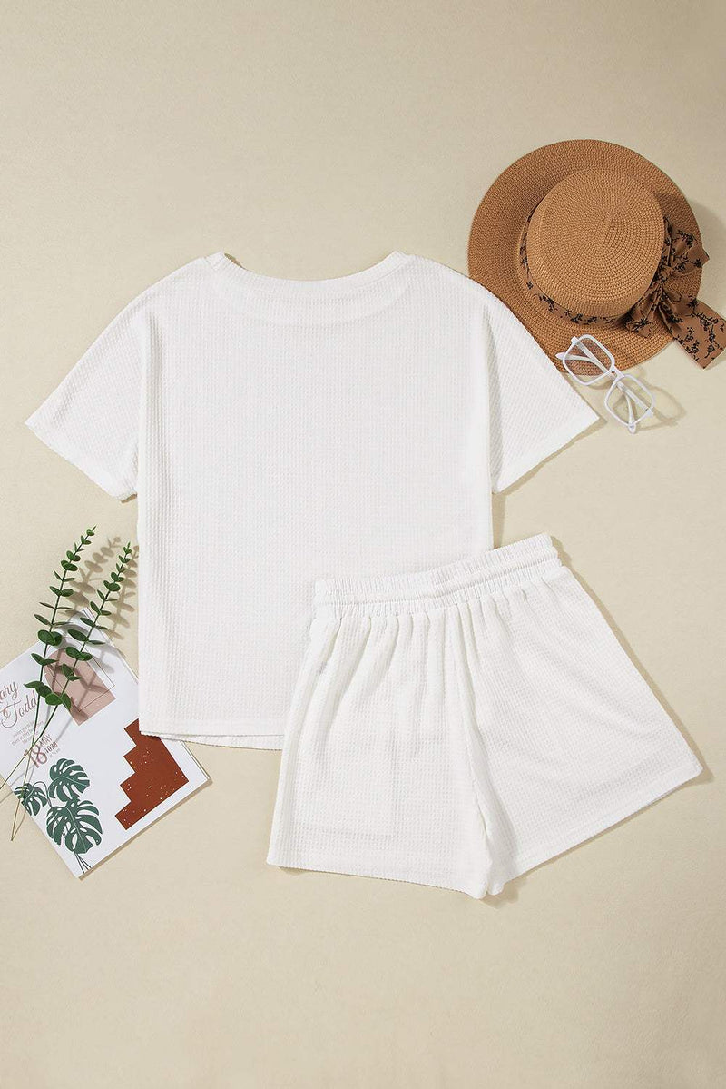 Round Neck Short Sleeve Top and Drawstring Shorts SetFeatures: Drawstring
Number of pieces: Two-piece
Stretch: Slightly stretchy
Material composition: 75% polyester, 25% viscose
Care instructions: Machine wash cold. TuAll TopsTrendsiKlondike Creek Unique BoutiqueRound Neck Short Sleeve Top