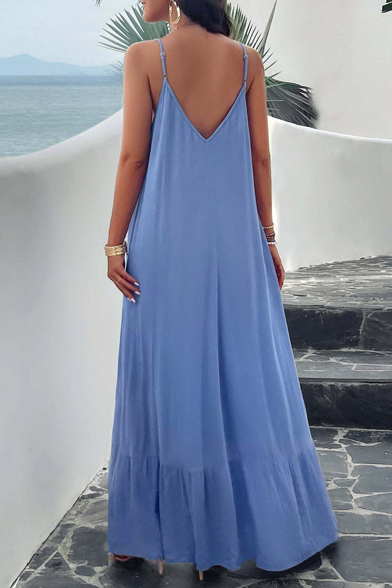 Devine Backless Maxi Cami Dress with Pockets in blue, features a flowing design with a slight stretch, made from 100% viscose.