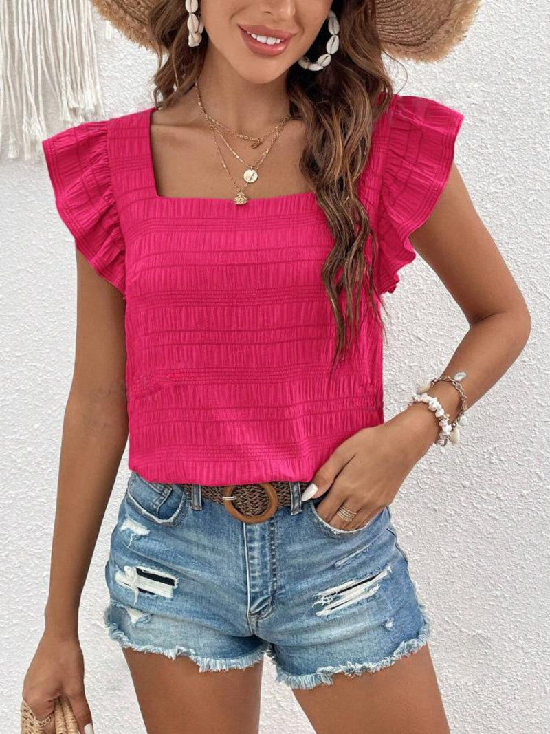 Ruffled square neck cap sleeve blouse in vibrant pink, casual summer wear.