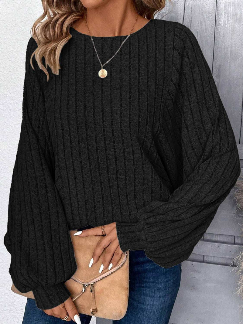 Plus size round neck batwing sleeve T-shirt in black, slightly stretchy, made of polyester and spandex.