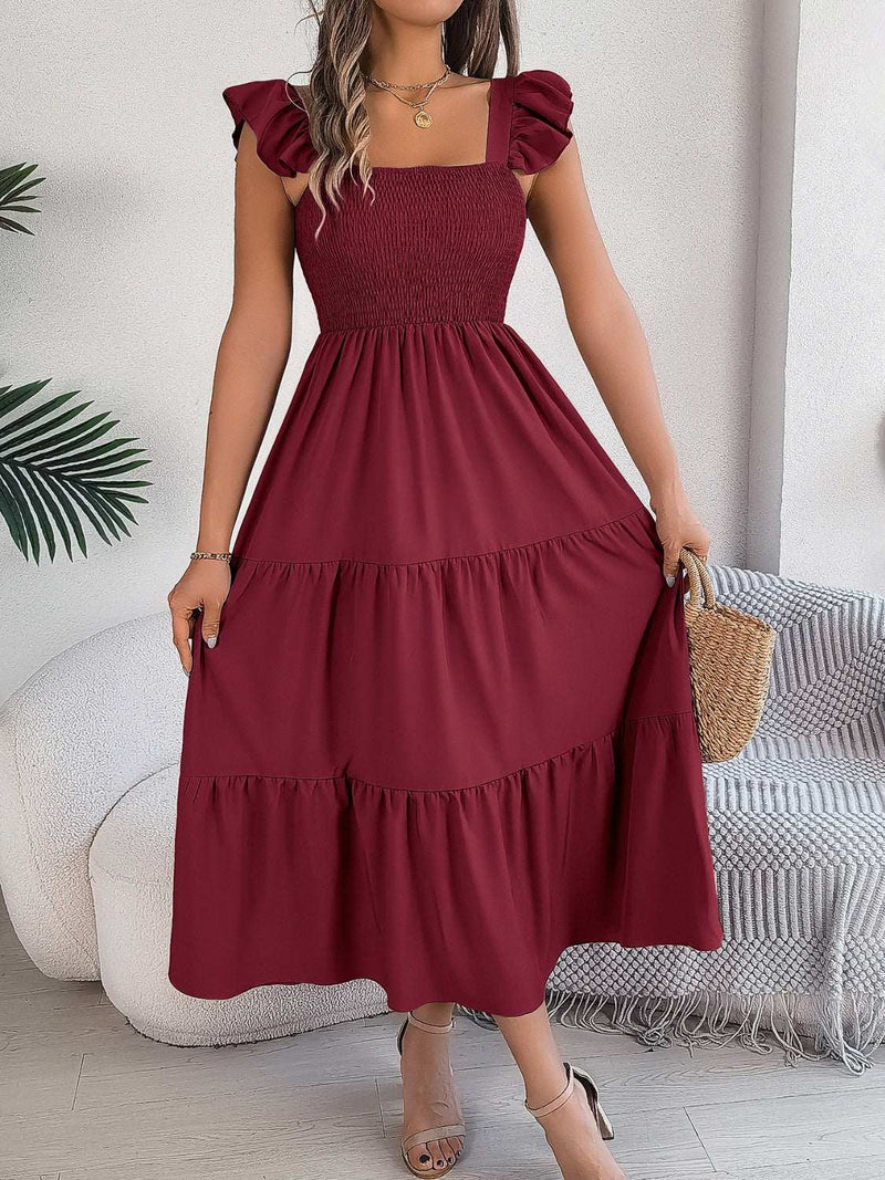 Smocked square neck cap sleeve midi dress in red.