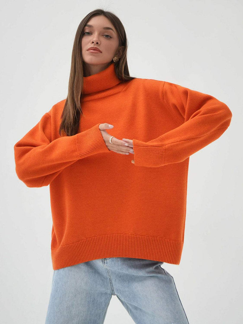 Orange turtleneck long sleeve sweater with slightly stretchy material.
