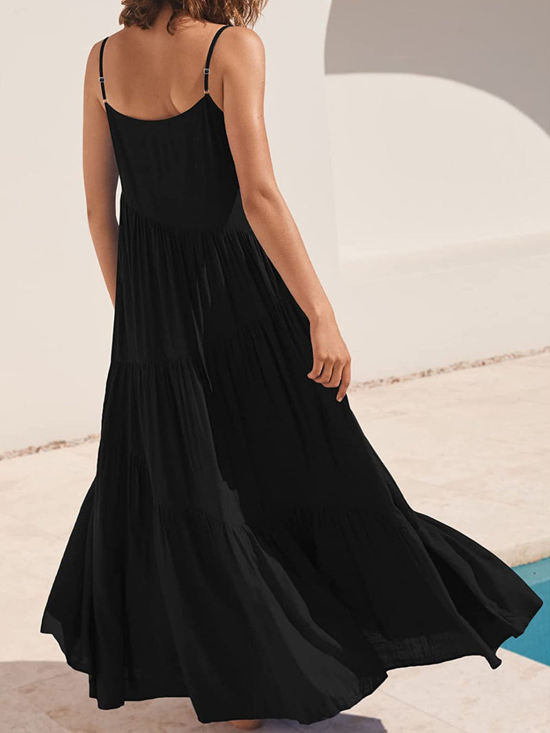 Full Size Ruched Tiered Spaghetti Strap Dress in black fabric, shown from the back.