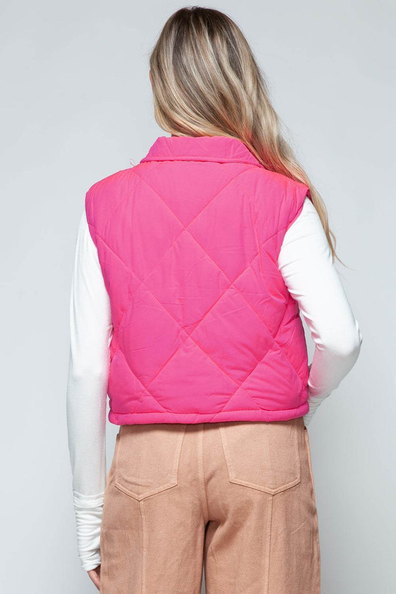 Snobbish Snap Down Quilted Crop VestThe snap-down quilted crop vest is a stylish and versatile addition to your wardrobe. With its snap-button closure and cropped length, this vest offers a modern and OuterwareTrendsiKlondike Creek Unique BoutiqueQuilted Crop Vest