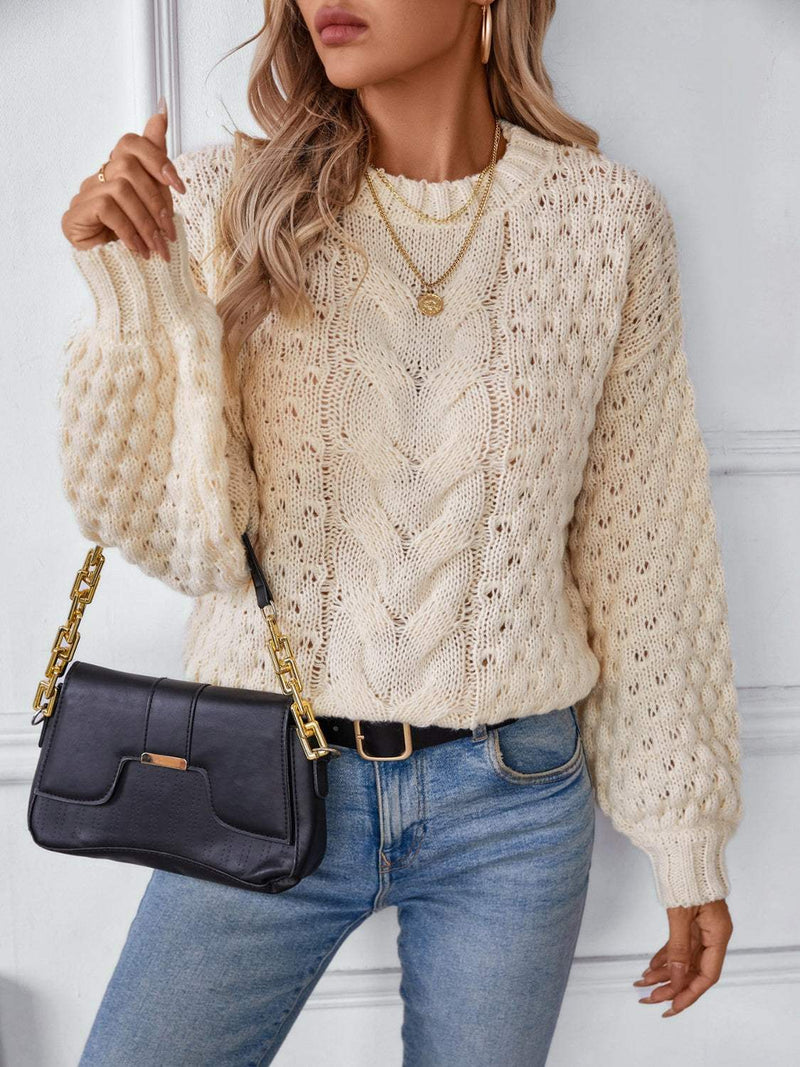 Cable-Knit Round Neck Long Sleeve Sweater in cream with textured design.