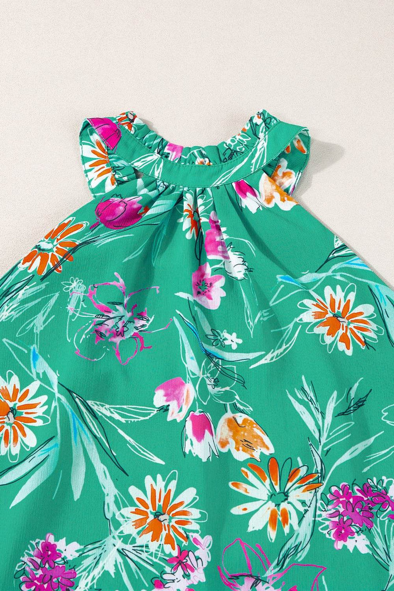 Frill Printed Grecian Tank with floral design on green fabric.