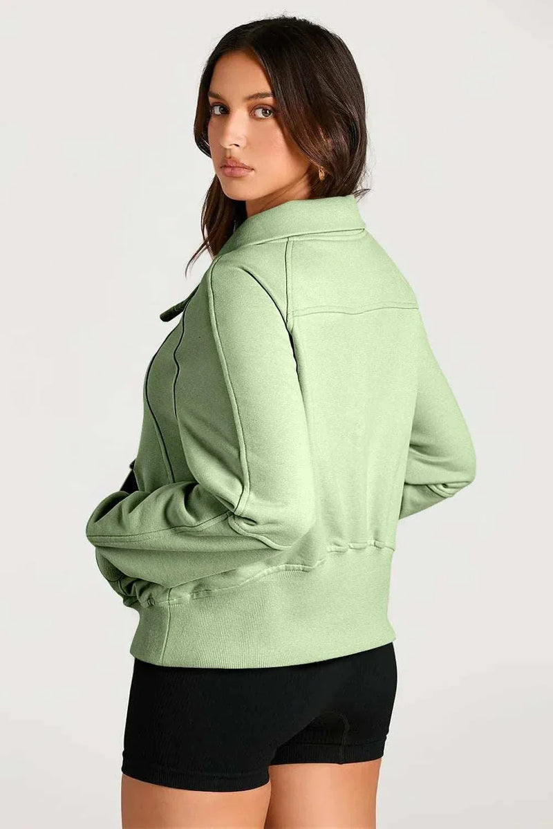 Half Zip Long Sleeve Sweatshirt in green, featuring soft fabric and modern half zip design.