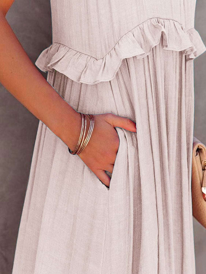 Ruffled sleeveless tiered maxi dress with pockets in beige.
