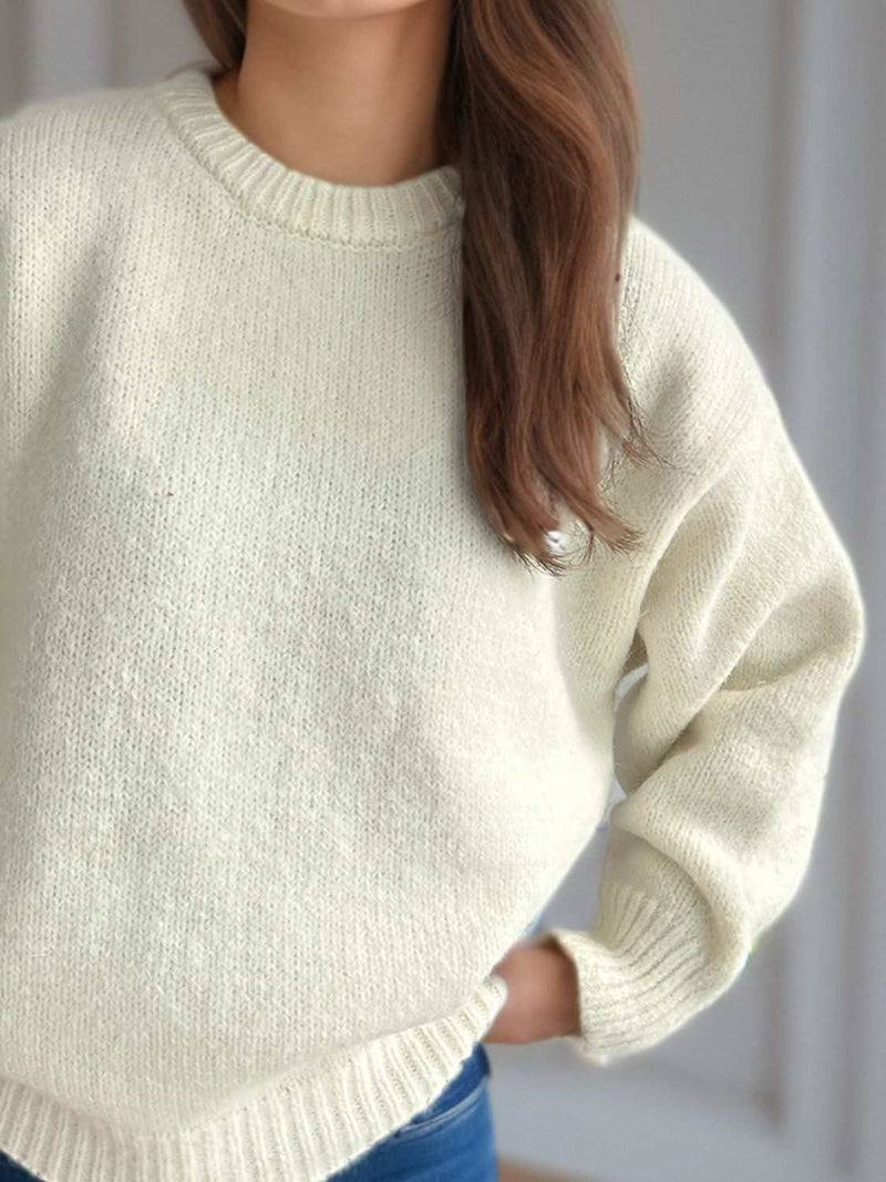 Round Neck Long Sleeve Sweater in soft fabric, cozy and stylish for chilly days.