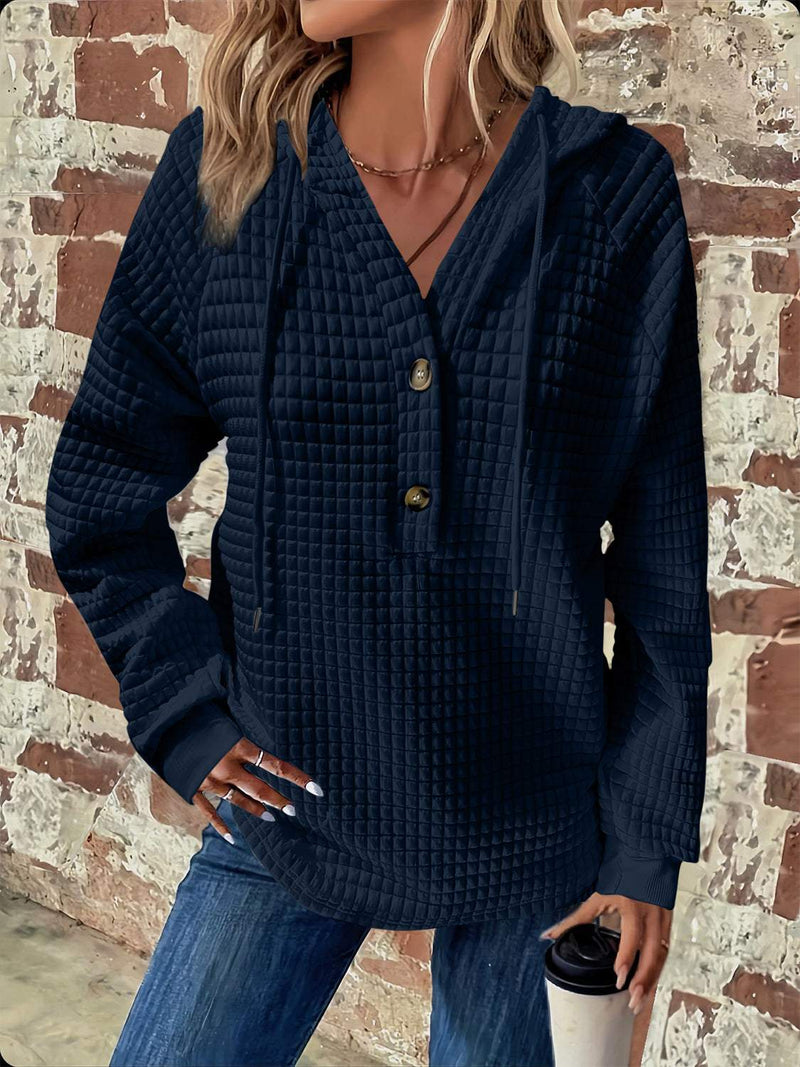 Full size texture drawstring hoodie with button detail and long sleeves.